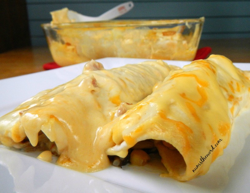 Preparing freezer meals for a month on a budget? Be sure to include this Black Beans & Rice Chicken Enchiladas recipe.