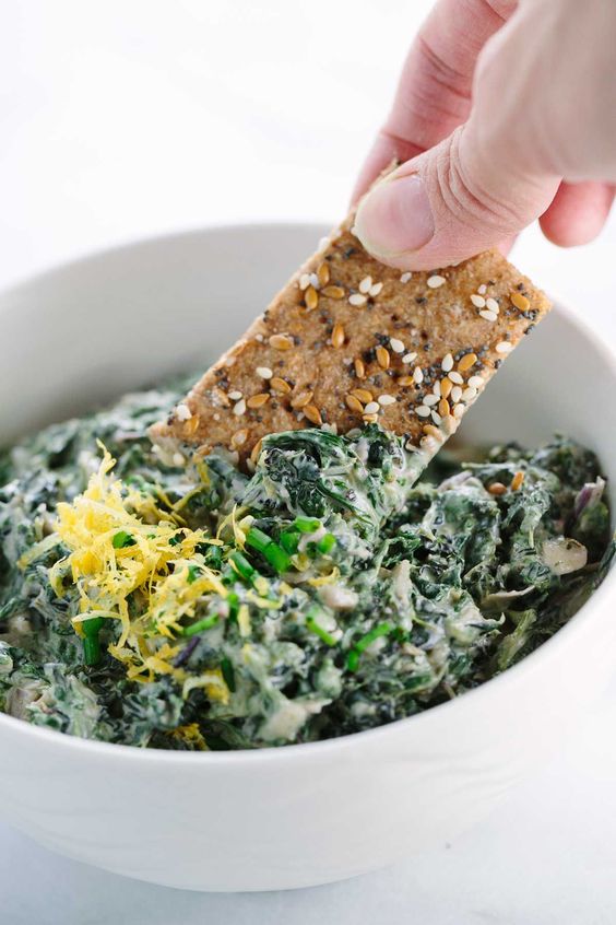 spinach_kale_yogurt_dip_with_whole_grain_crackers Find out how to incorporate healthy snack ideas and recipes in your day with this helpful article. | healthy snacks recipes | healthy snack ideas for weight loss | healthy snacks for weight loss at night | healthy snacks for adults #healthyrecipes #mealprep #healthyeating #healthylife #nutrition #healthyhabits #wellness #keepingfit #healthyrecipes
