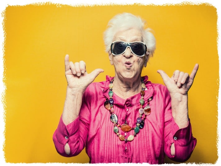 An elderly woman wearing colorful clothes and expressing her individuality how to love yourself.