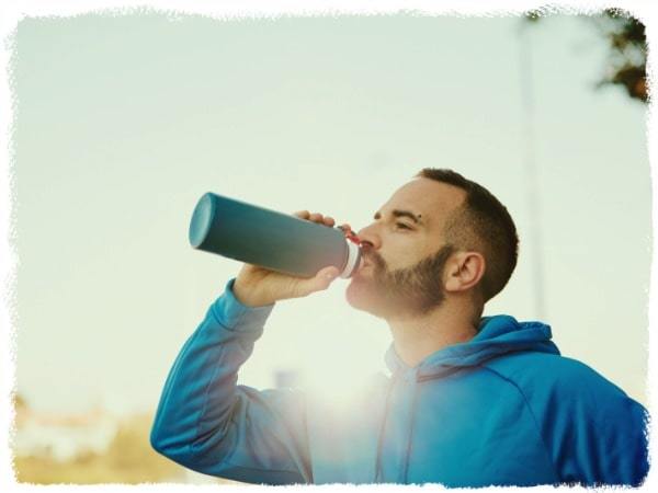 man-drinking best water bottle brand | best insulated water bottle | what is the healthiest water bottle to use